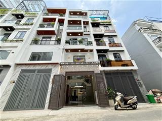 Nhà bên chợ, đường thông trần quang cơ, dt4.2x13m, lửng, 3lầu, 4pn, gara ô tô, sân thượng, 6,3 tỷ