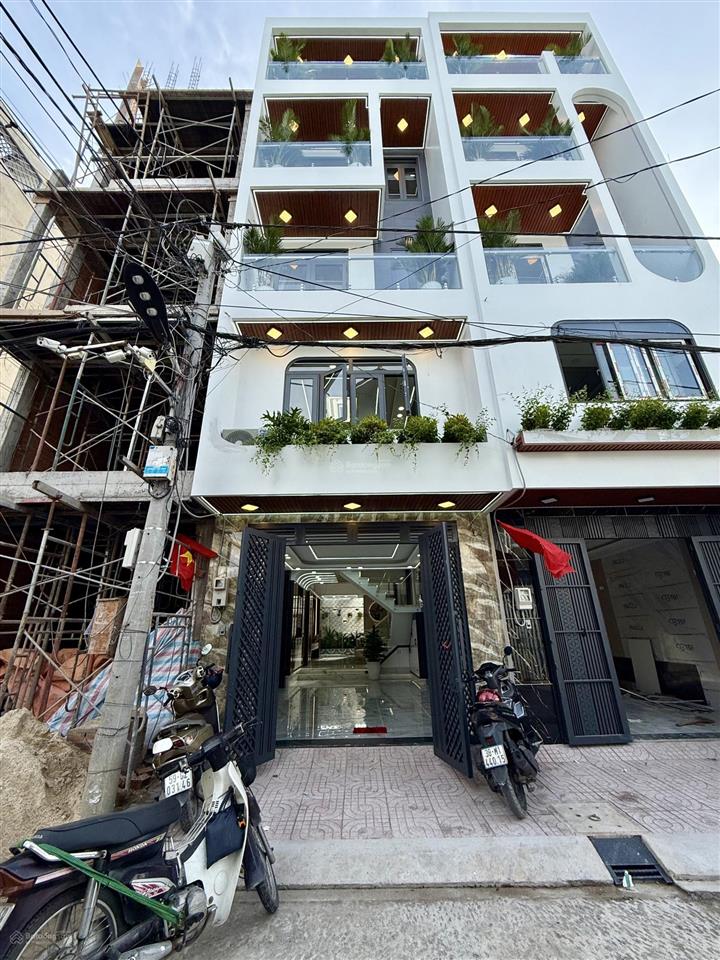 Nhà đường thông dt4.2x19m, lửng, 3lầu, 4pn, 6vs, p/thờ, gara ô tô, sân thượng, hướng đông, 7,4 tỷ