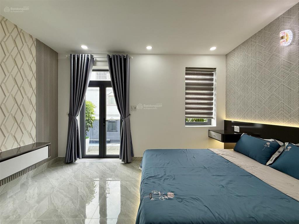 Nhà bên trường học, đường trần thị năm, dt 4,5x12m, lửng, 3lầu, 4pn, gara ô tô, sân thượng