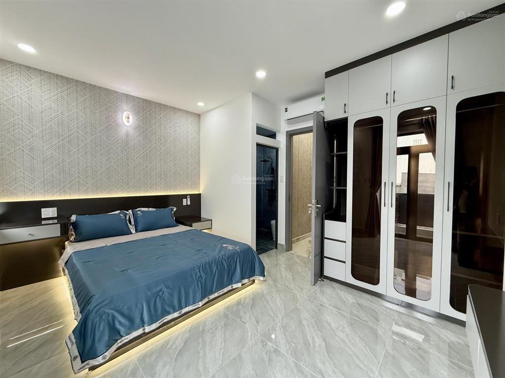 Nhà bên trường học, đường trần thị năm, dt 4,5x12m, lửng, 3lầu, 4pn, gara ô tô, sân thượng