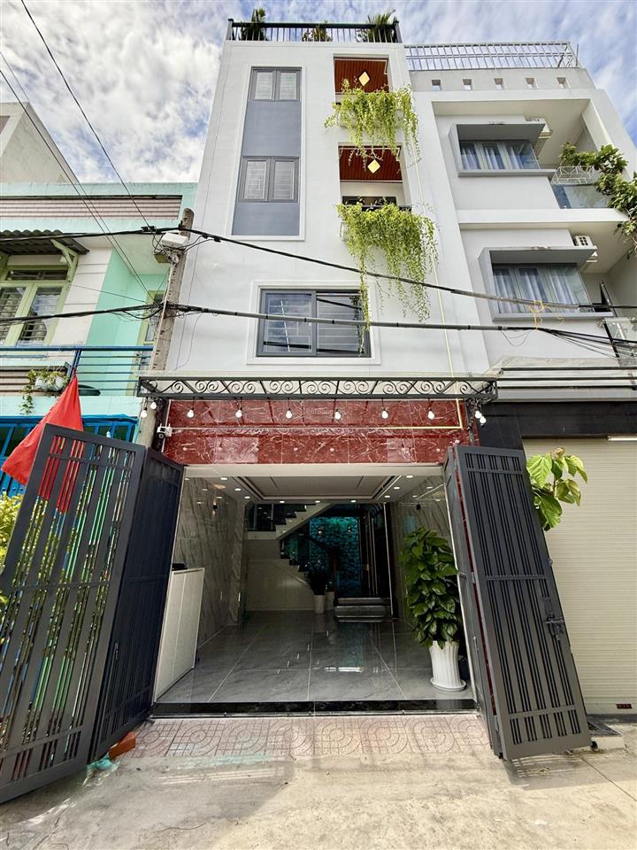 Nhà hẻm xe hơi đường tx 25, dt4x13m, lửng, 3 lầu, gara ô tô, 4pn, sân thượng trước sau, 6tỷ