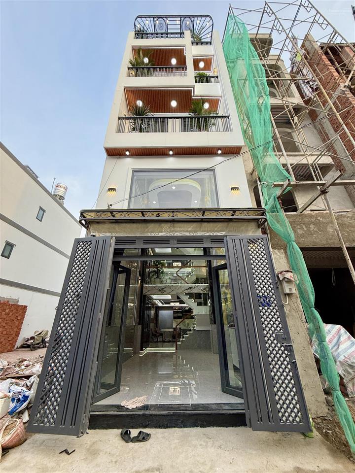 Nhà ngay sát bên ngã tư ga, dt 4x16m, lửng, 3lầu, 4pn, 5vs, p. thờ, s. thượng, gara xe, 6.85 tỷ