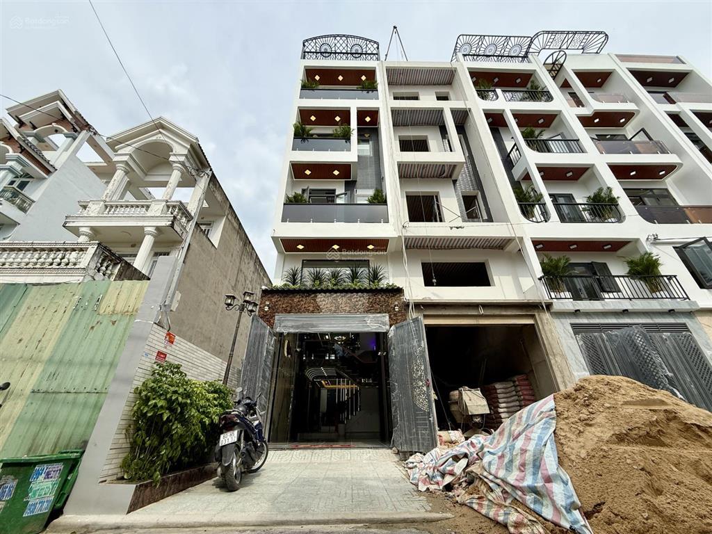 Nhà có thang máy đường thông dt 4x20m, lửng, 3 lầu, 4pn, gara ô tô, p. thờ, sân thượng, 7.9 tỷ