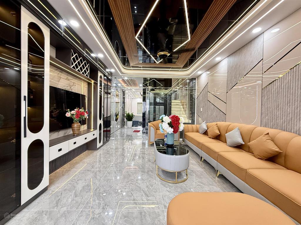 Nhà mặt tiền có thang máy, đường tx 25, dt4.2x25m, lửng, 4lầu, 7vs, gara ôtô, 4pn, p.thờ, s.thượng