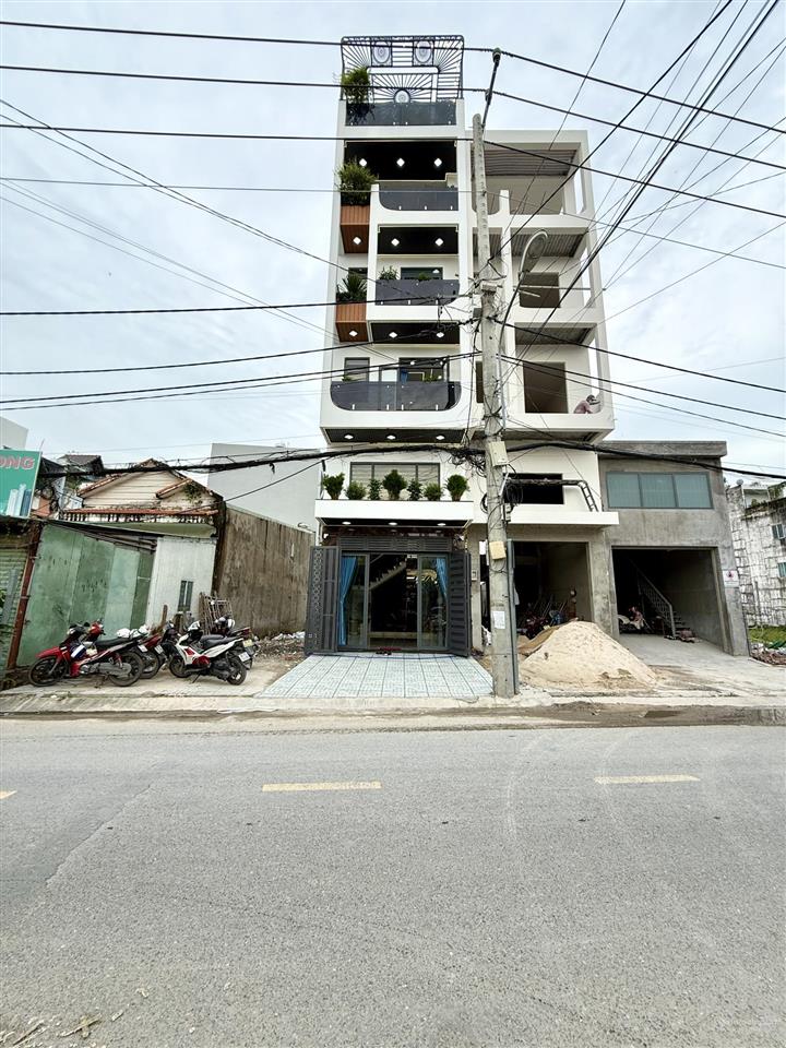 Nhà mặt tiền có thang máy, đường tx 25, dt4.2x25m, lửng, 4lầu, 7vs, gara ôtô, 4pn, p.thờ, s.thượng