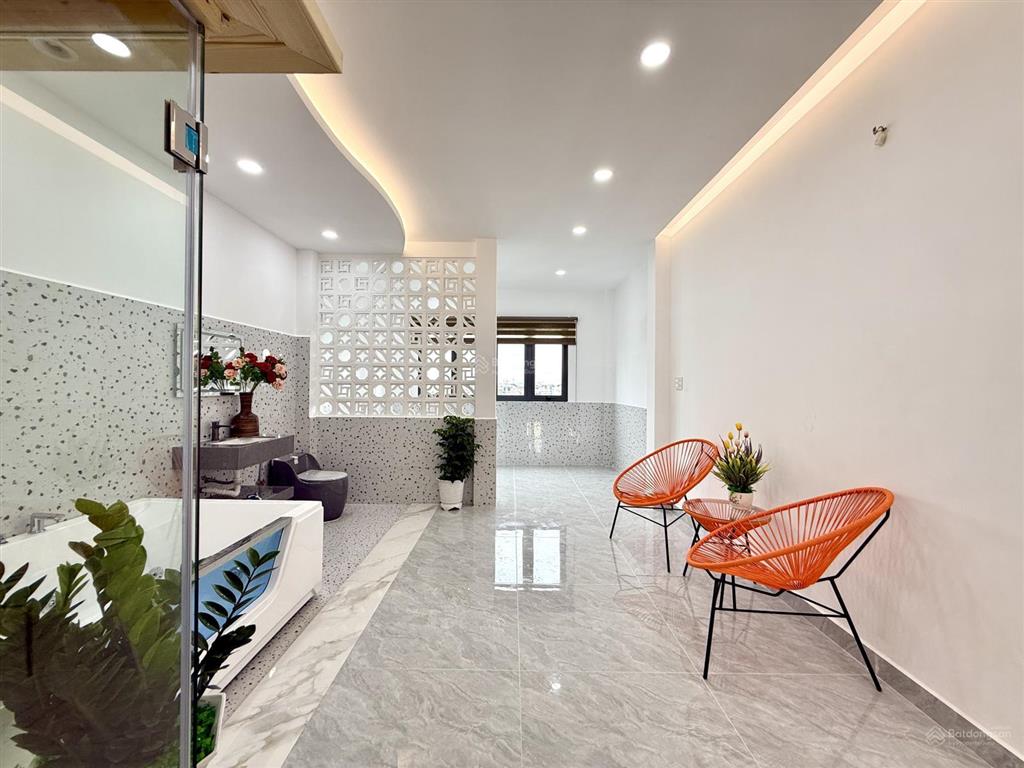 Nhà mặt tiền có thang máy, đường tx 25, dt4.2x25m, lửng, 4lầu, 7vs, gara ôtô, 4pn, p.thờ, s.thượng