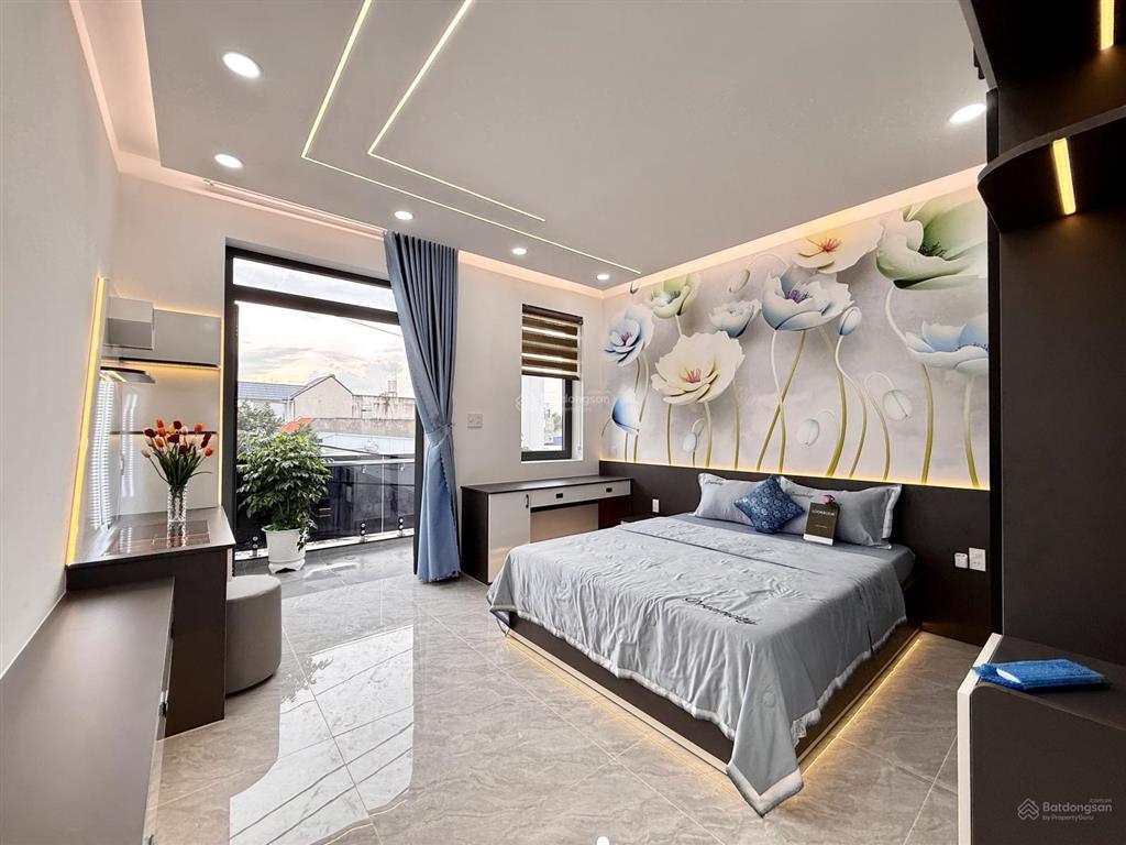 Nhà mặt tiền có thang máy, đường tx 25, dt4.2x25m, lửng, 4lầu, 7vs, gara ôtô, 4pn, p.thờ, s.thượng