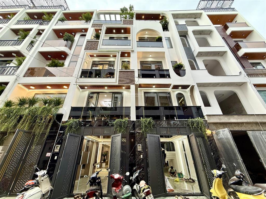 Nhà full nội thất, đường tx 25, dt4x14m, lửng, 3 lầu, 4pn, 6vs, gara ôtô, p.thờ, sân thượng,