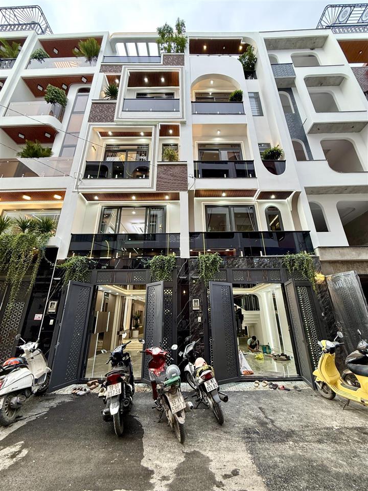Nhà full nội thất, đường tx 25, dt4x14m, lửng, 3 lầu, 4pn, 6vs, gara ôtô, p.thờ, sân thượng,