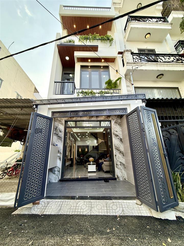 Nhà đường thông xe hơi, bên trường tiểu học, dt 4x13.5m, trệt, 2 lầu, 3pn, sân trước, sân thượng