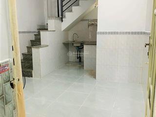 Tôi bán nhà 42 m2 sd, 1 trệt. 1 lầu đúc, tuyệt đẹp, quận 7. giá 869 triệu