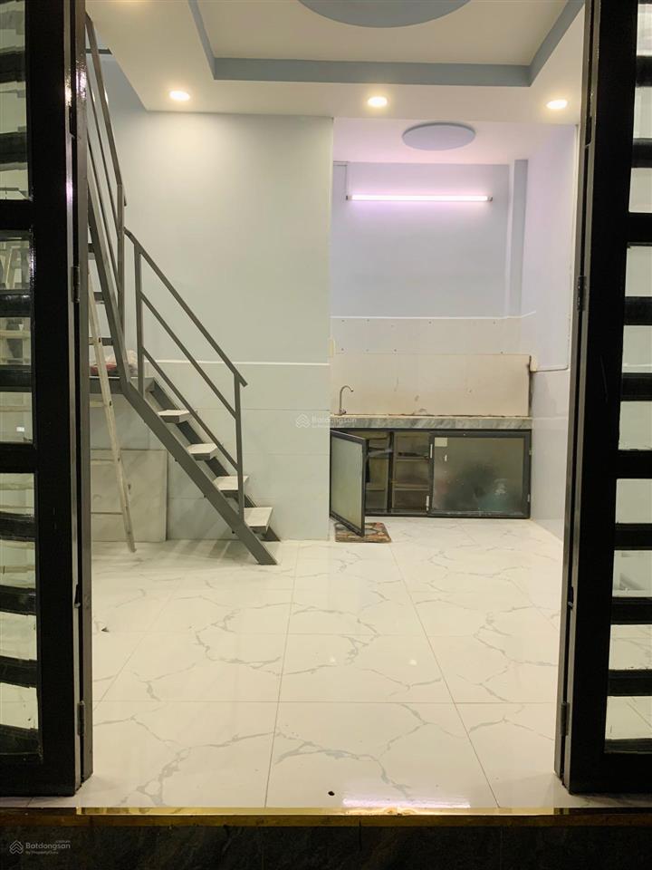 Tôi bán nhà 38 m2, 1 trệt. 1 lầu, tuyệt đẹp. quận 7. giá 800 triệu