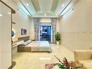 Căn hộ mini siêu rộng 57m2 ban công máy giặt riêng full nội thất mới 100% gần cầu kiệu tiện đi q1
