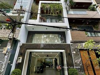Nhà gò vấp  giáp quận t.tâm, sân bay  5 x 20  5 tầng có thang máy  đường 10 m thông