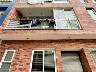 Bán Tòa APARTMENT Xuân Diệu lô góc, Dt 75m2, mt 14m, ô tô đỗ cửa.
