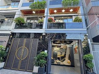 Bán nhà xây mới, full nội thất, xe hơi đậu trong nhà