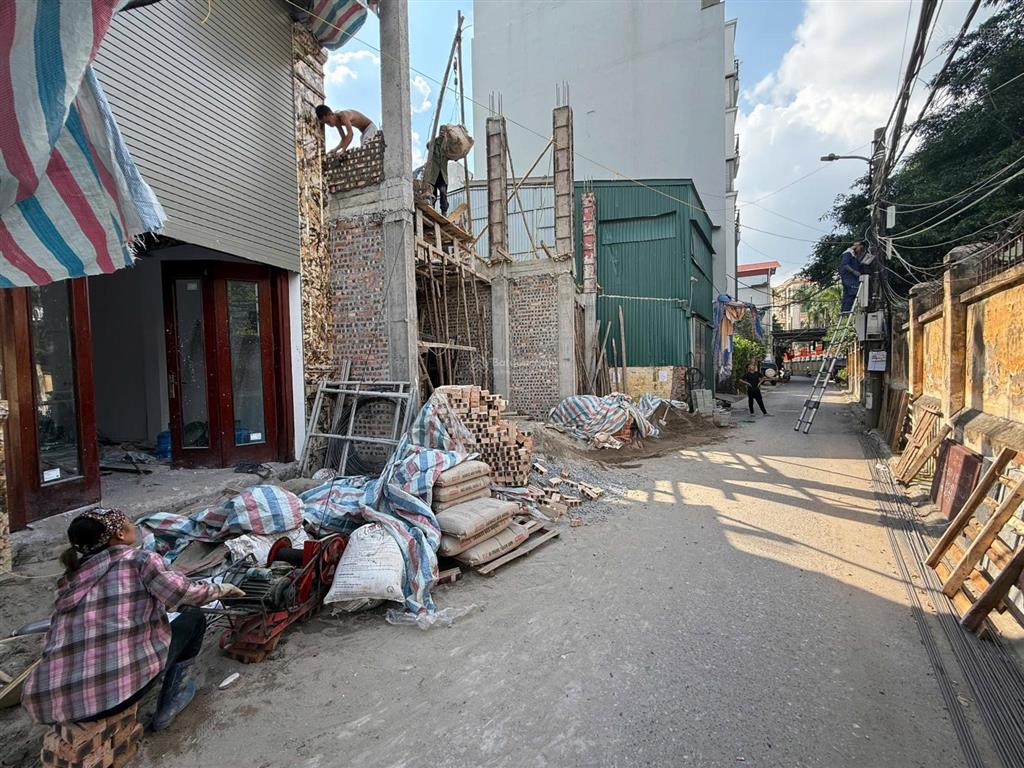 Bán căn nhà xây tâm huyết 7t thang máy 45m2 lô góc oto tải ra vào nằm ngay sài đông vũ xuân thiều