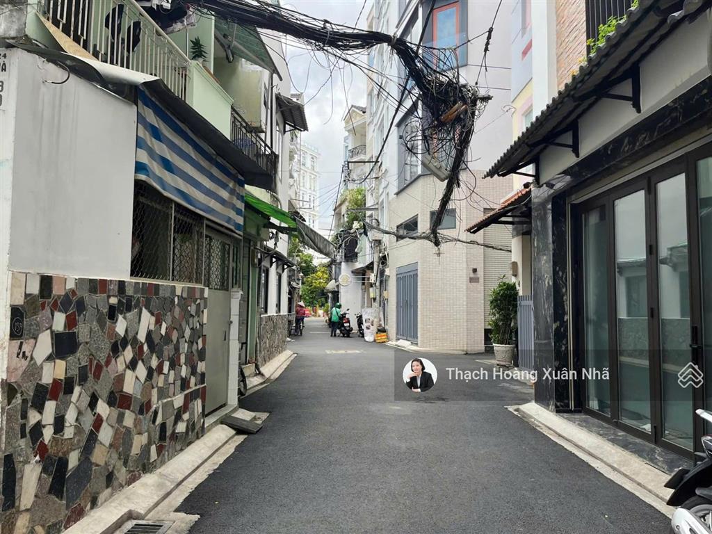 Giảm gần 2 tỷ bán gấp hxh hoàng văn thụ, pn  7,45 x 13,5m  5 tầng + thang máy  19,7 tỷ còn 18 tỷ