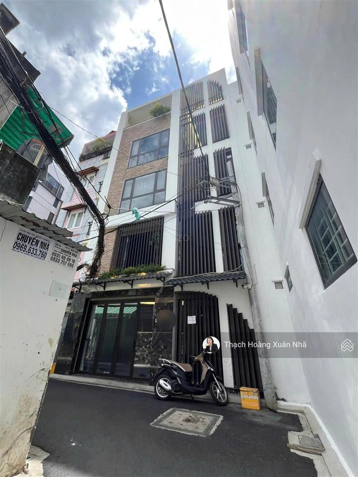 Giảm gần 2 tỷ bán gấp hxh hoàng văn thụ, pn  7,45 x 13,5m  5 tầng + thang máy  19,7 tỷ còn 18 tỷ