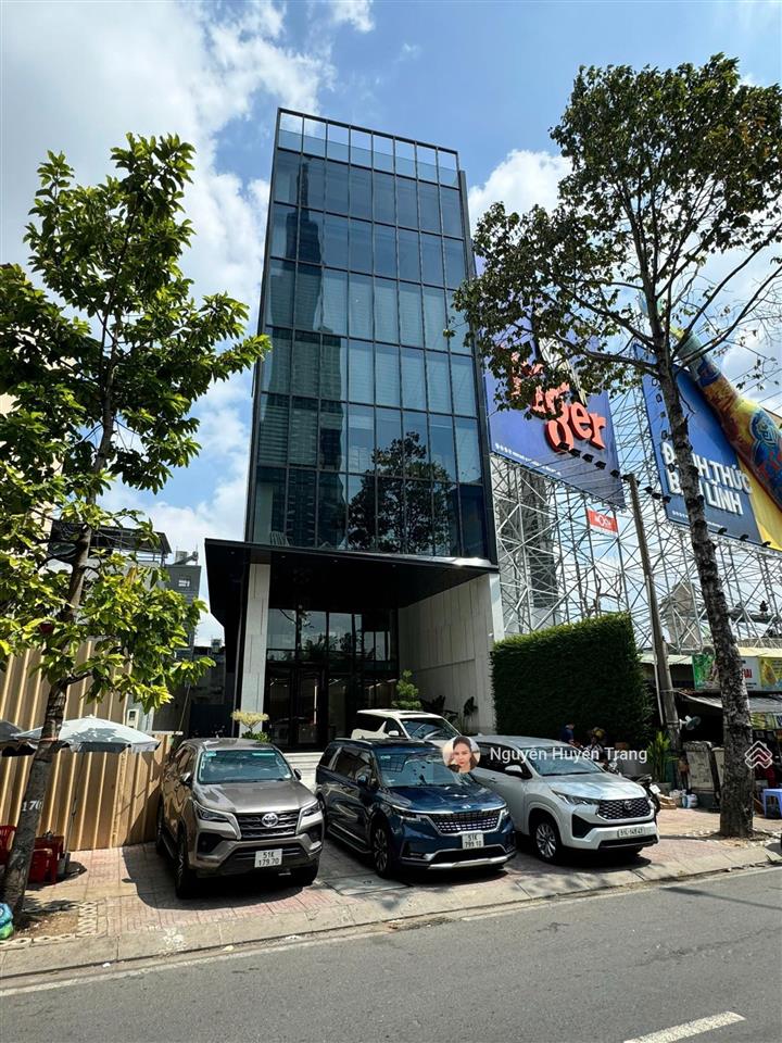 Tòa building khan hiếm hầm  7 tầng góc 2mt phan đăng lưu p6 bt (13x22m) hđt 350tr/th chỉ 99 tỷ