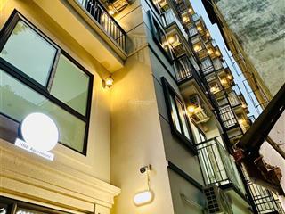 Bán toà apartment phố cầu giấy.dt 180m x7t thang máy 35 phòng full nội thất.gần ô tô.giá 56 tỷ