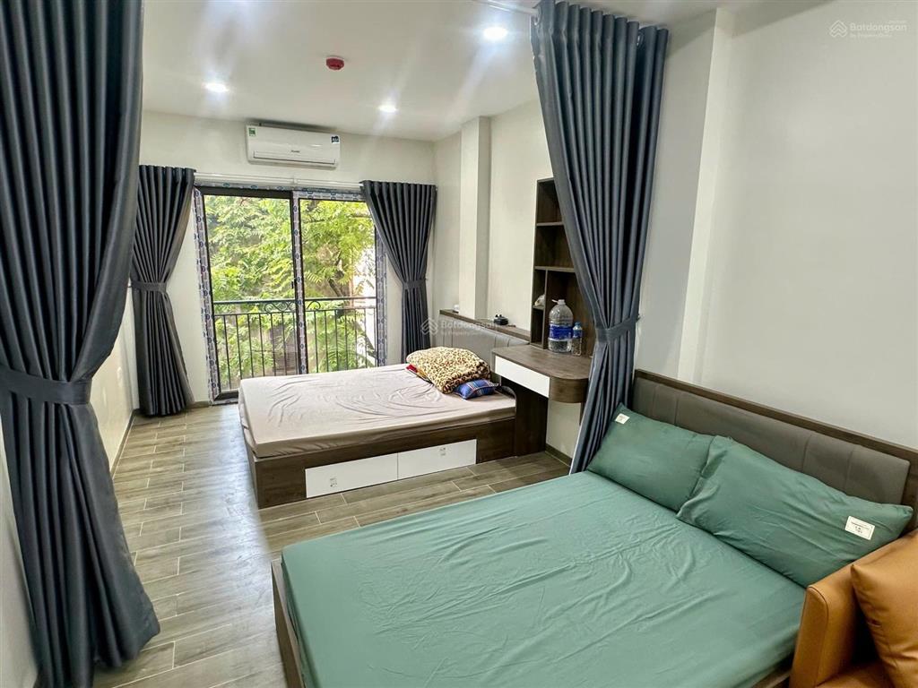 Bán toà apartment phố cầu giấy.dt 180m x7t thang máy 35 phòng full nội thất.gần ô tô.giá 56 tỷ