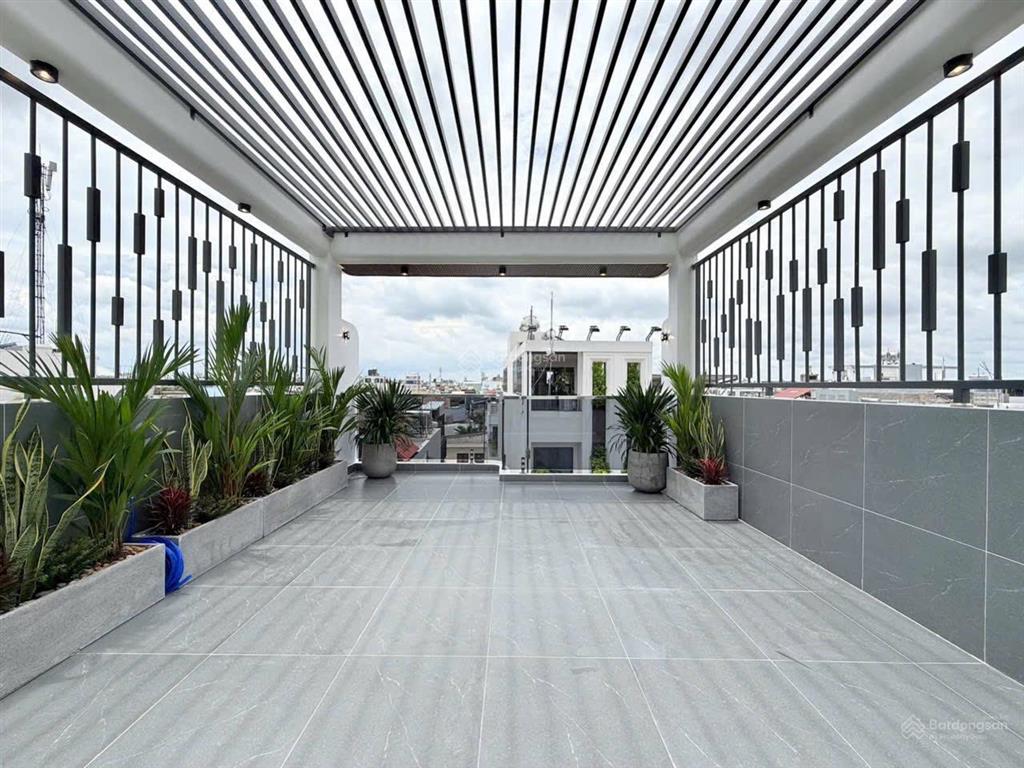 Bán căn hxh thông 5 m gần mt lê văn thọ  thang máy thiết kế hiện đại