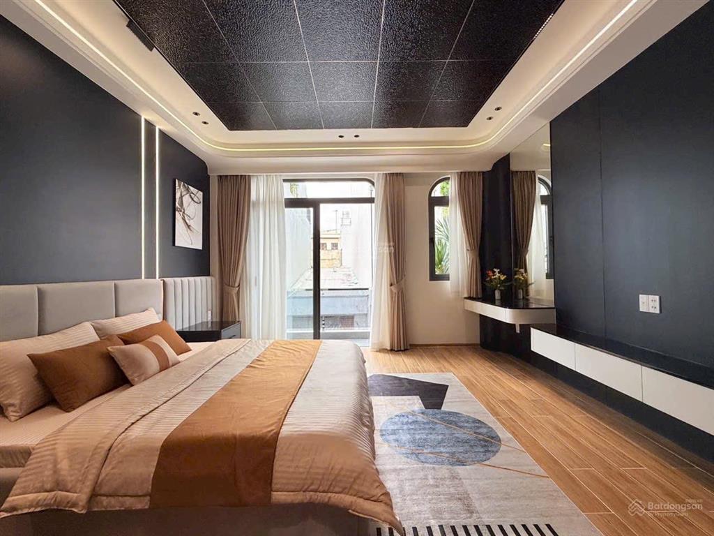 Bán căn hxh thông 5 m gần mt lê văn thọ  thang máy thiết kế hiện đại