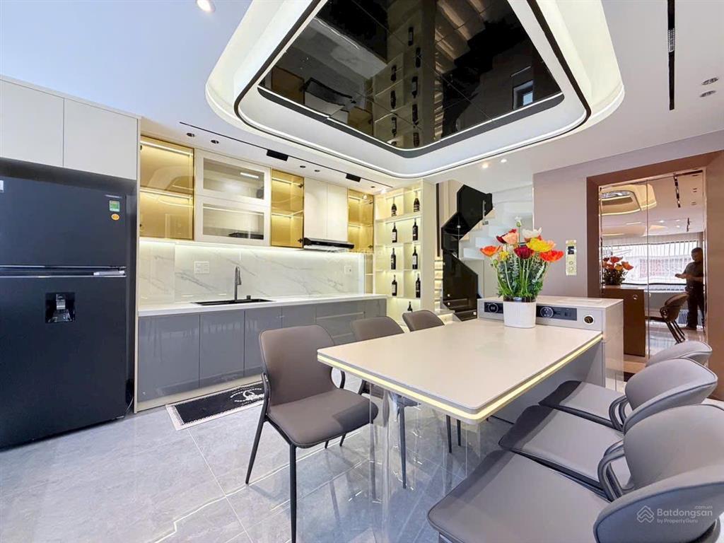 Bán căn hxh thông 5 m gần mt lê văn thọ  thang máy thiết kế hiện đại