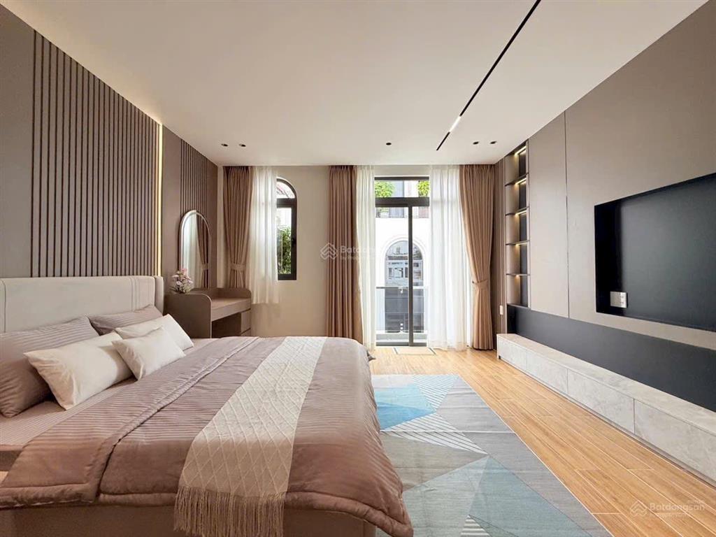 Bán căn hxh thông 5 m gần mt lê văn thọ  thang máy thiết kế hiện đại