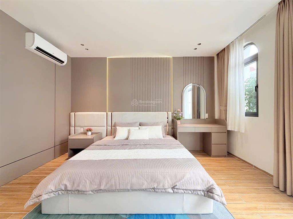 Bán căn hxh thông 5 m gần mt lê văn thọ  thang máy thiết kế hiện đại