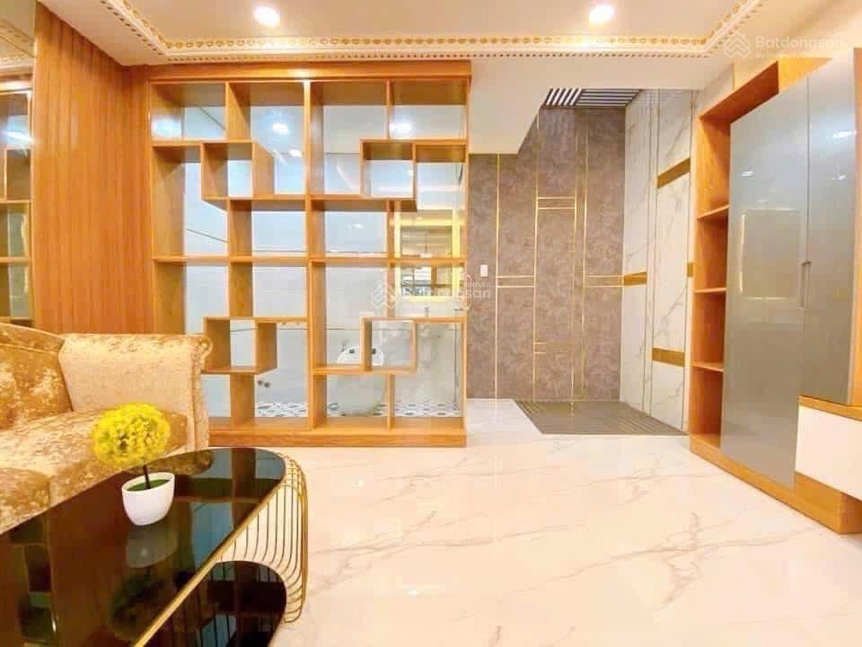 Hiếm nhà đẹp mê ly 5 tầng full nt cao cấp hẻm ô tô thông ngang 4,5x15m ngay an nhơn chỉ 10tỷ8