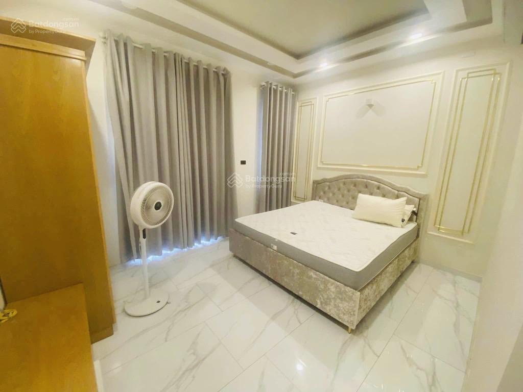 Hiếm nhà đẹp mê ly 5 tầng full nt cao cấp hẻm ô tô thông ngang 4,5x15m ngay an nhơn chỉ 10tỷ8