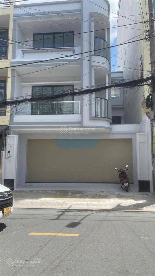 Nhà mtkd trên đường tân sơn nhì. diện tích 8x18m. trệt 2 lầu