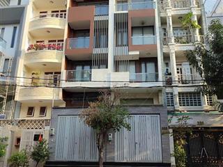 Bán lẻ hoặc cặp nhà đôi mới 100%mtkd chợ lớn 8x18m 1 hầm 6 tầng  2 mặt tiền công viên sau lưng