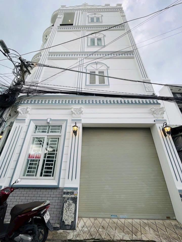 BÁN NHÀ 1T3L đúc, GÓC 2MT + Trục Chính Hẻm. Có luôn chổ để ÔTÔ trong nhà