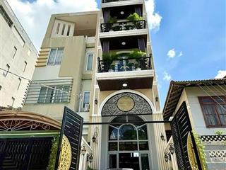 Nhà mặt tiền đường số  trung tâm quận 7  6 tầng  mới  full nt  thang máy  gara