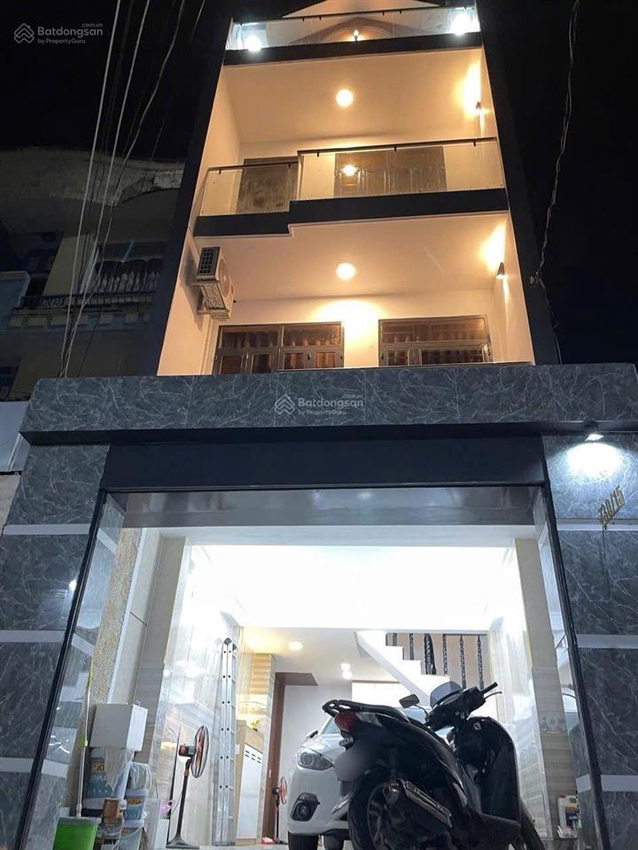 Hết khả năng trả lãi bán nhà 4 tầng hxh, để xe hơi trong nhà, ngã 4 phú thuận, quận 7.