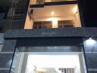 Hết khả năng trả lãi bán nhà 4 tầng hxh, để xe hơi trong nhà, ngã 4 phú thuận, quận 7.