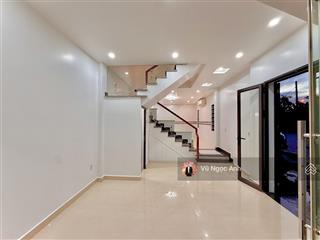 Nhà lô góc 4 tầng thành tô gara oto nhiều cửa sổ thoáng sáng