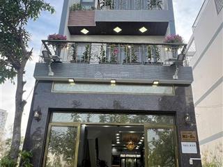 Nhà phố mới 100% có thang máy đường huỳnh tấn phát , nhà 4 lầu giá 9.2 tỷ
