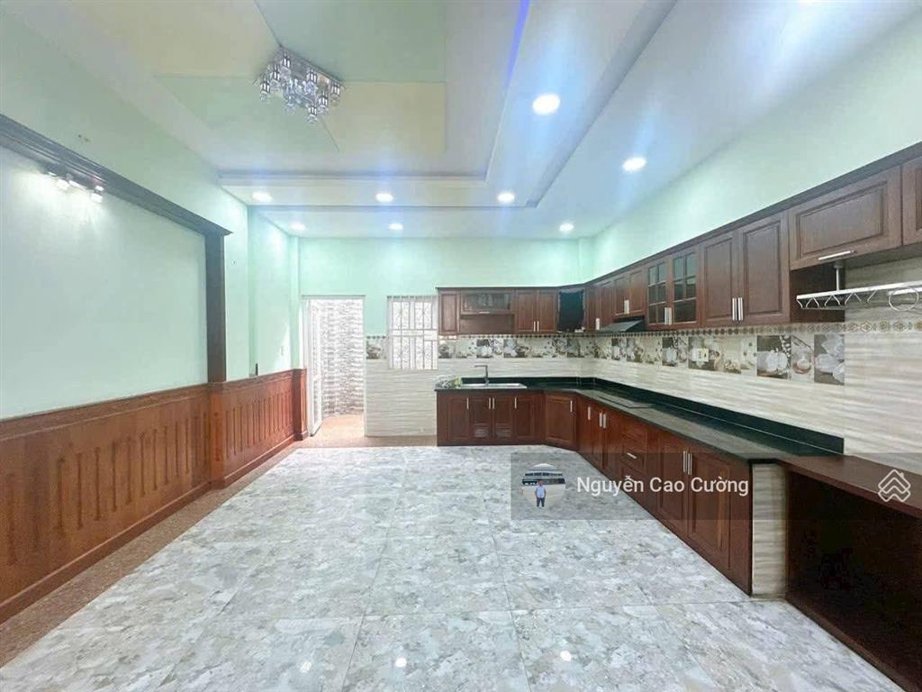 Nhà mặt tiền trần thị cờ 5x26m đúc 4 tầng đường 20m kinh doanh buôn bán sầm uất, thới an, q12