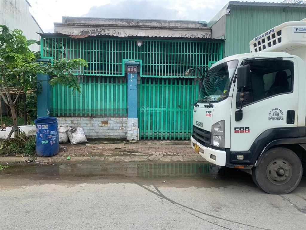 Bán đất tặng nhà kiên cố dt 124m2 đường nhựa 10m mặt tiền kinh doanh kdc vĩnh phú 1