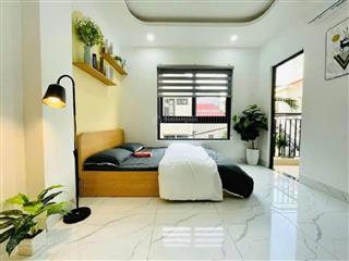 Bán tòa chdv kim mã  85m2*8t, tm 14phòng kk pccc đạt chuẩn  dt 900tr/năm