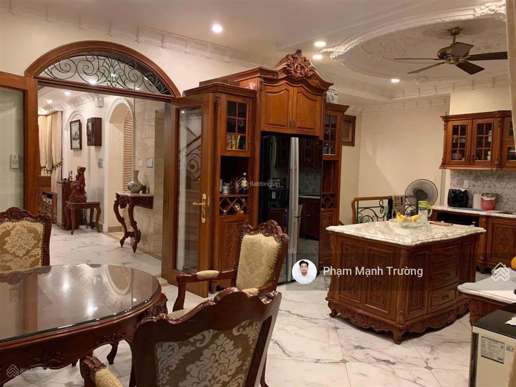 Biệt thự huỳnh văn bánh | 10x26m | hầm 4 tầng + thang máy | nội thấp ốp gỗ |