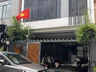 Toà nhà vp cty trần nhật duật q1  dt 6 x 17m  4 tầng  xe hơi ngủ trong nhà  giá chỉ 37,5 tỷ