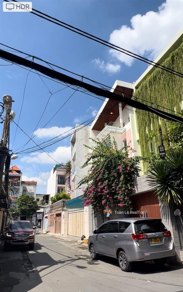 Biệt thư khu compound phú nhuận ngang 7.1m  4 tầng st  xe hơi đậu 3 chiếc  giá chỉ 26 tỷ tl
