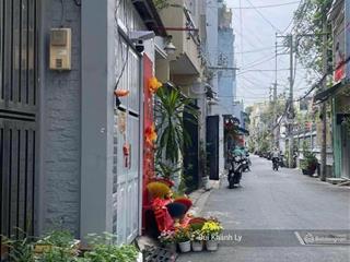 Bán nhà phú nhuận hẻm xe hơi huỳnh văn bánh  hđ 25tr/th 4 tầng st  gần lê văn sỹ