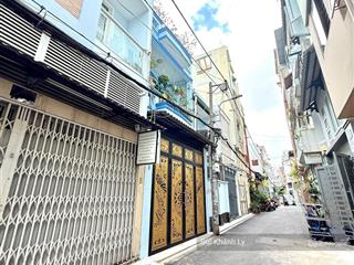 Bán nhà phú nhuận hẻm xe hơi thông hồ biểu chánh 5 tầng gần lê văn sỹ