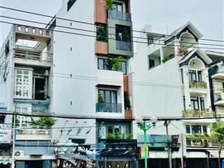 Nhà mới 4 tầng mặt tiền 12m có thang máy 650kg đường tân sơn p12 gò vấp. dt 4x25m, giá 19.8tỷ tl